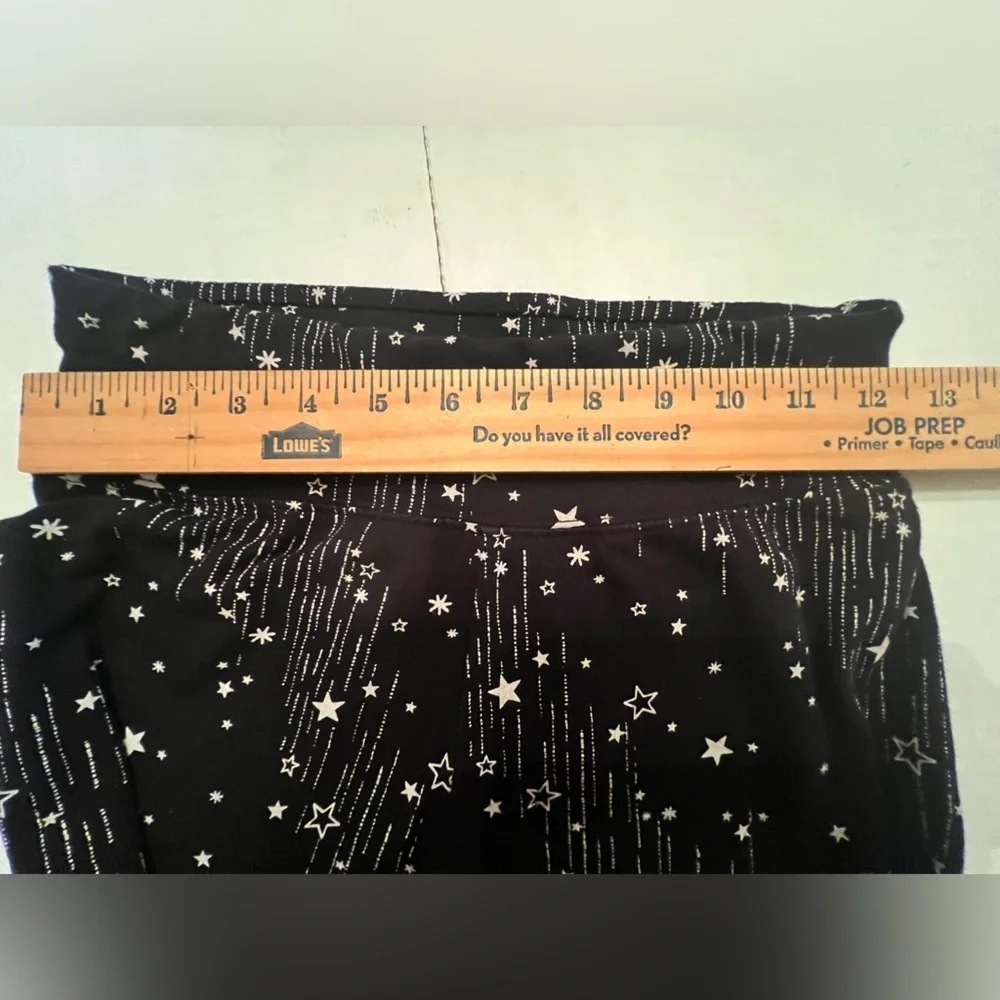 JUSTICE GIRLS LEGGINGS. SIZE 14/16  BLACK WITH STARS AND LINES